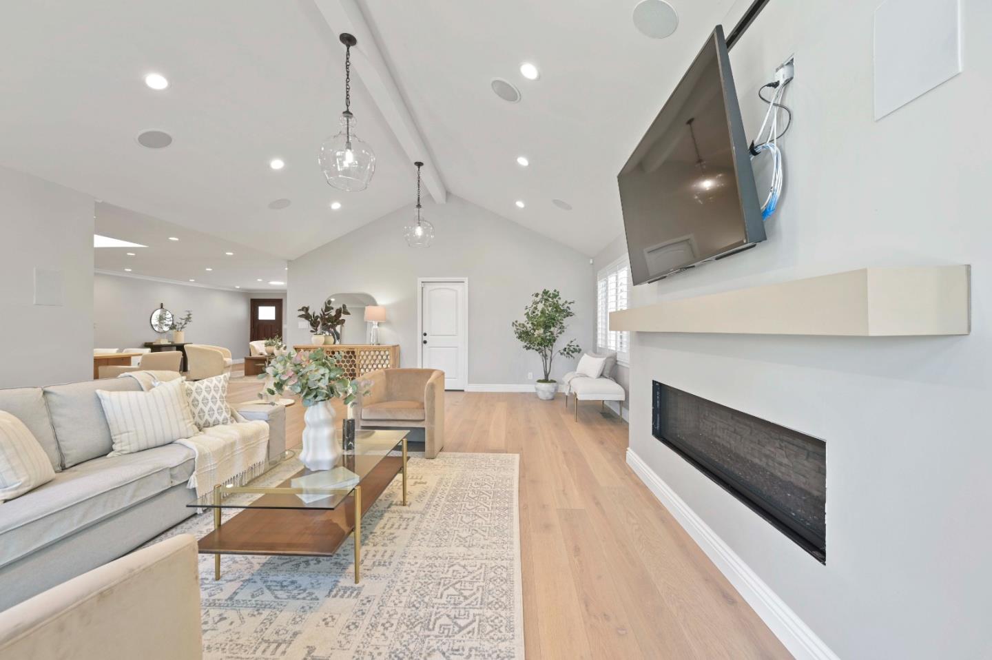 754 26th Avenue San Mateo, CA 94403 - Photo 54 of 57 a living room with furniture and a fireplace