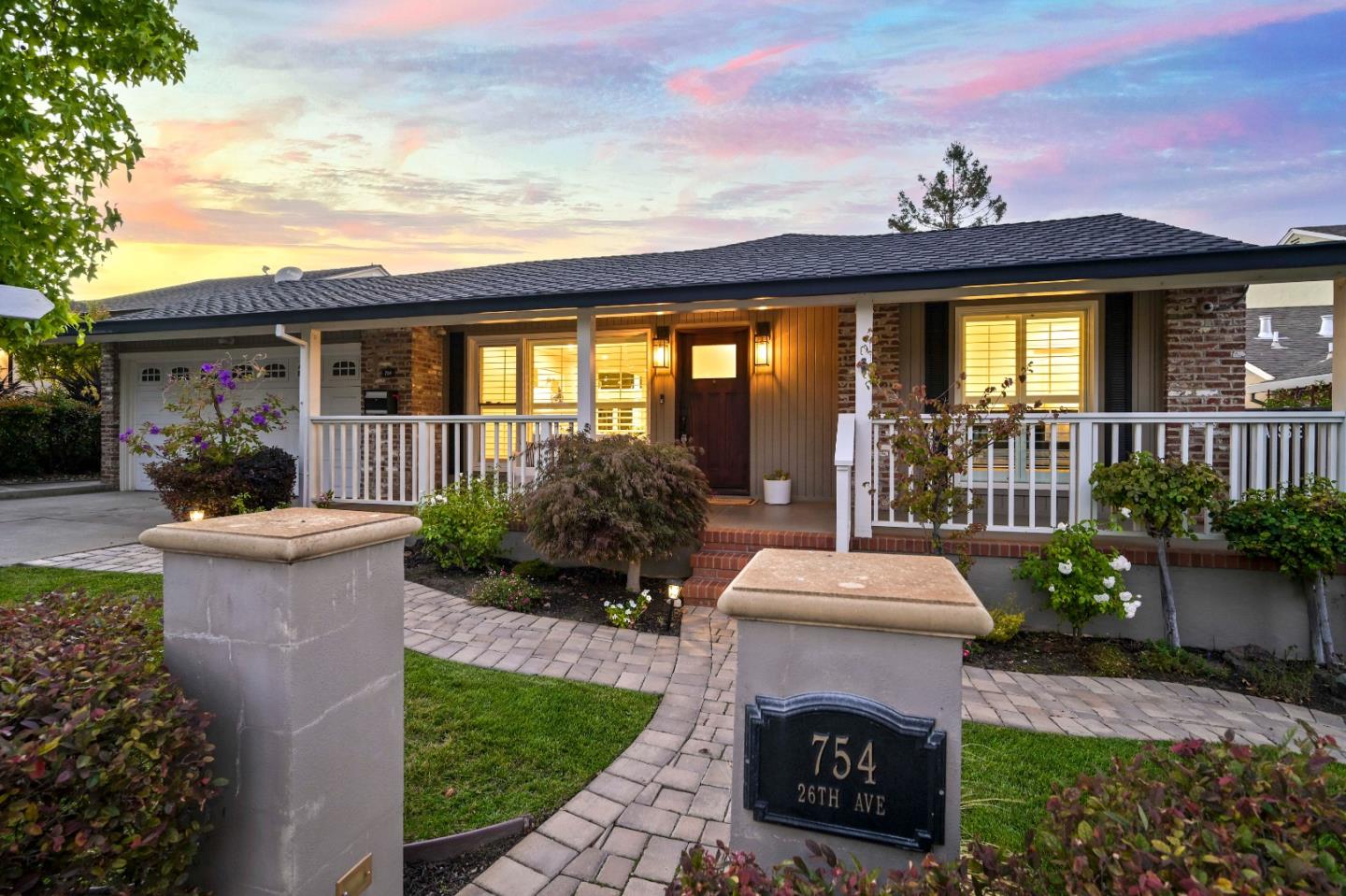 754 26th Avenue San Mateo, CA 94403 - Photo 6 of 57 a front view of a house with a garden and outdoor seating