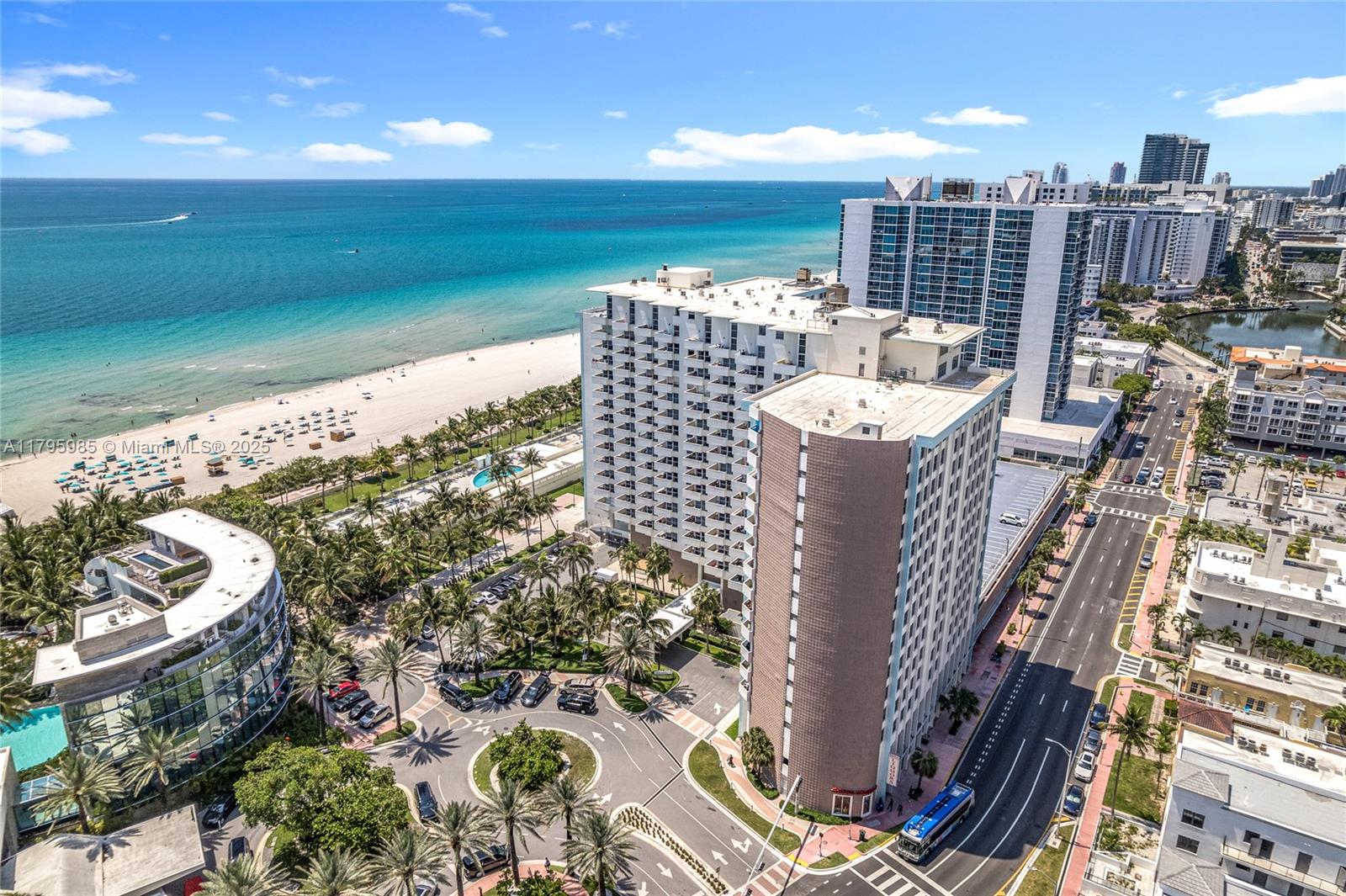 2899 Collins Avenue, Unit 1218 Miami Beach, FL 33140 - Photo 2 of 41 a view of a balcony with wooden floor