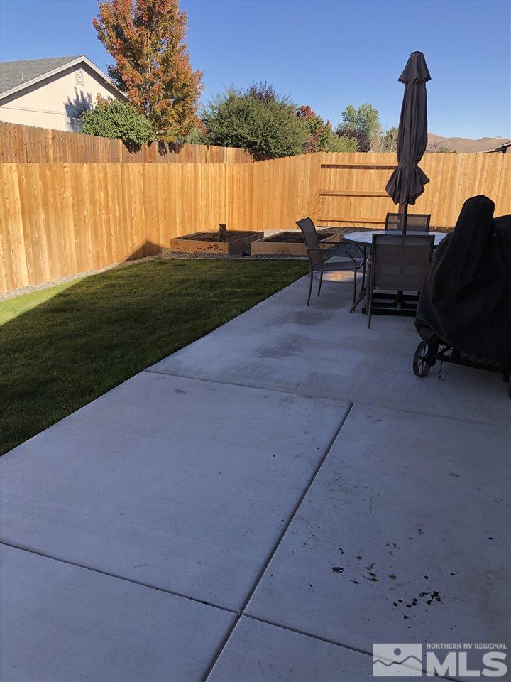 9329 Lagoon Court Reno, NV 89506 - Photo 13 of 15 a view of a lake with outdoor space