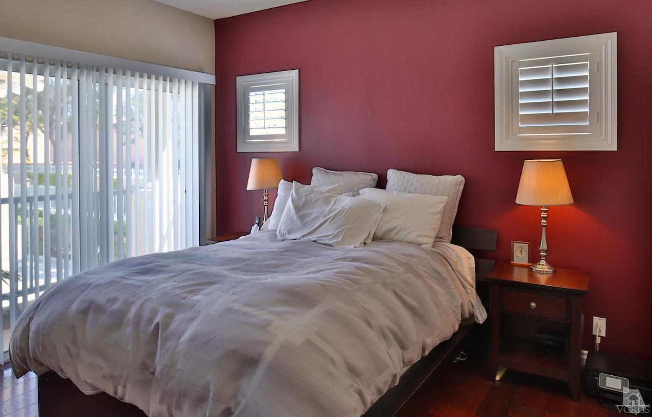 4241 Rusticview Court Moorpark, CA 93021 - Photo 13 of 26 a bed sitting in a bedroom next to a window