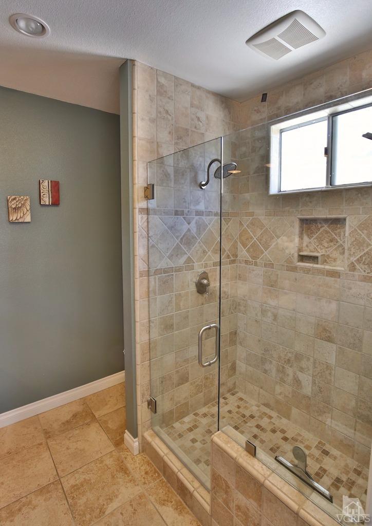 4241 Rusticview Court Moorpark, CA 93021 - Photo 18 of 26 a bathroom with a shower