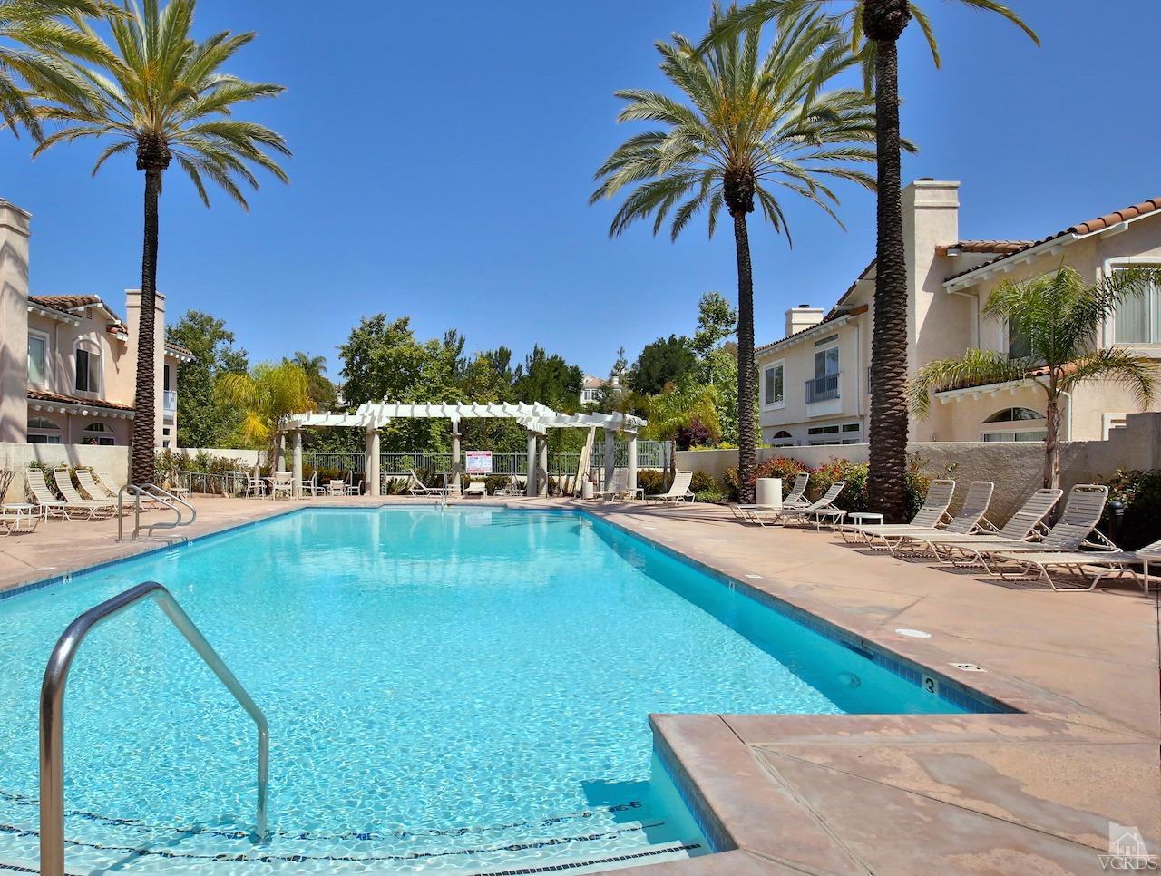 4241 Rusticview Court Moorpark, CA 93021 - Photo 26 of 26 a house view with a swimming pool and sitting space