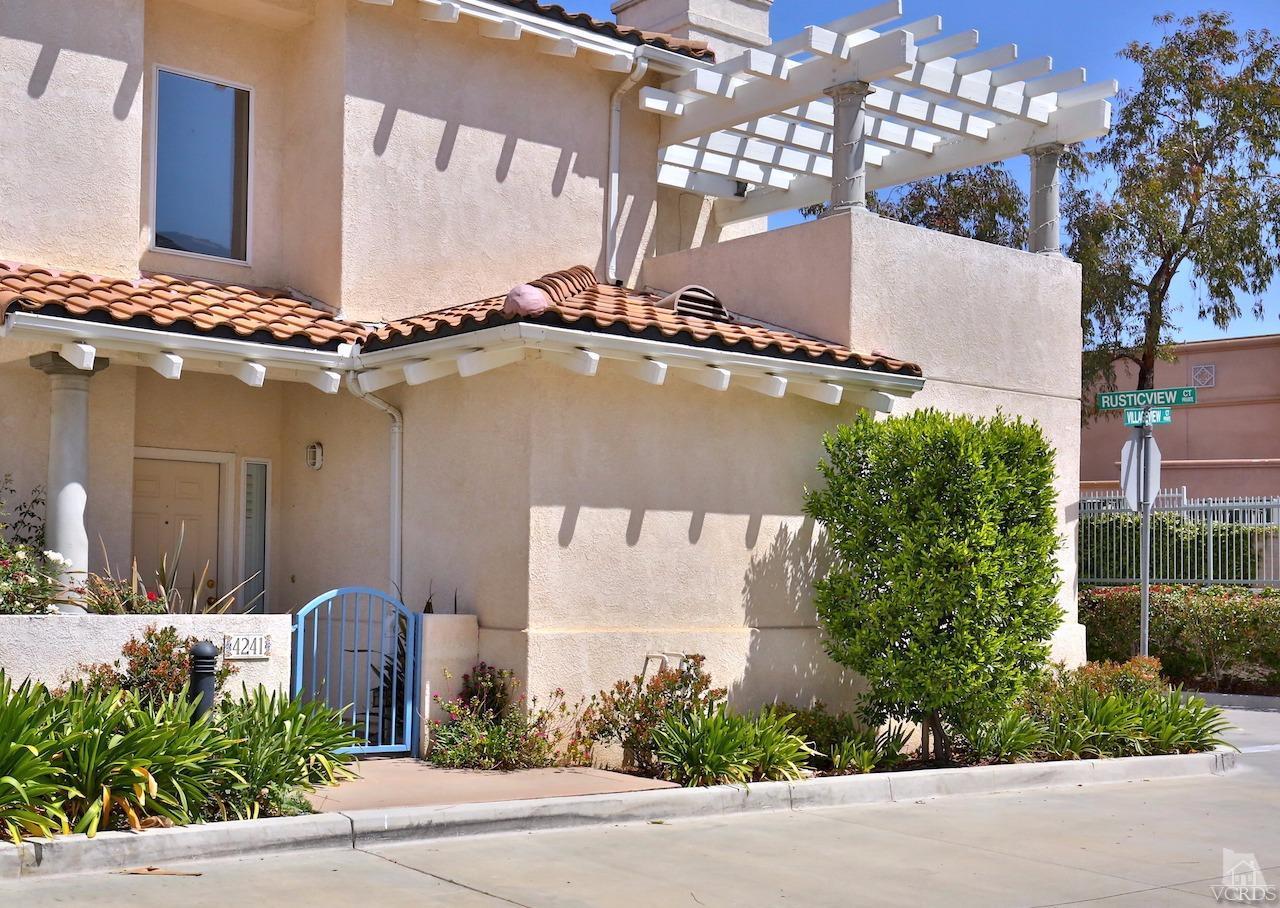 4241 Rusticview Court Moorpark, CA 93021 - Photo 4 of 26 a front view of building with yard