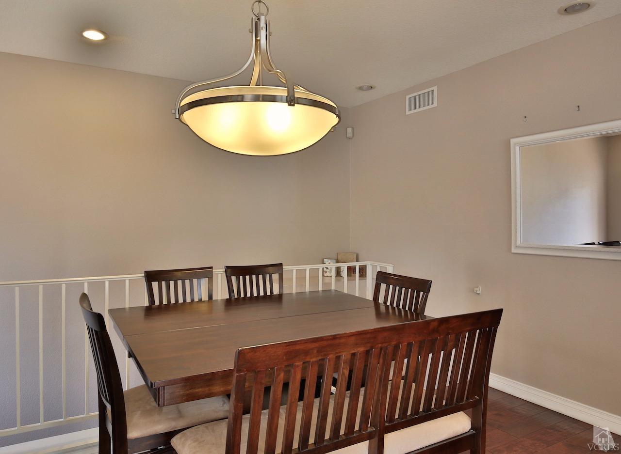 4241 Rusticview Court Moorpark, CA 93021 - Photo 9 of 26 a view of a dining room with furniture