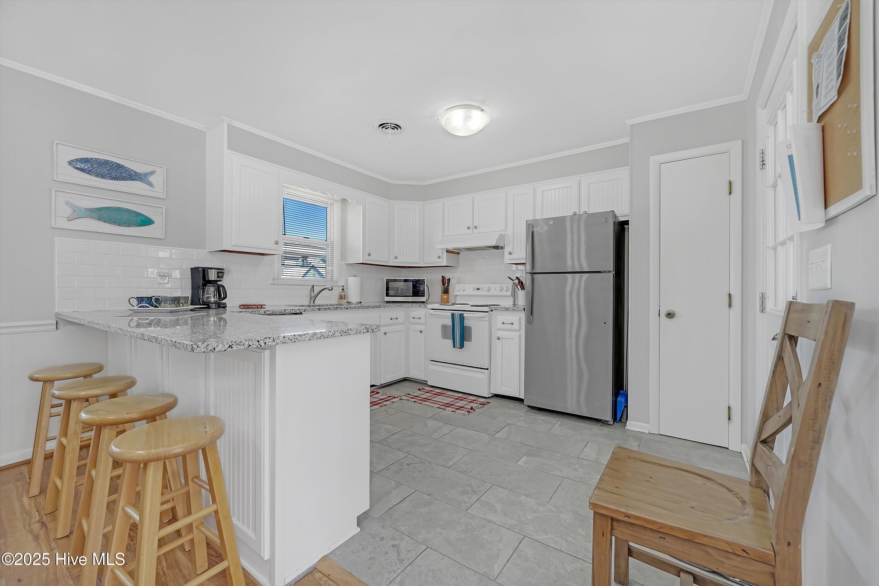 426 3rd Street Sunset Beach, NC 28468 - Photo 8 of 21 10-A7409733
