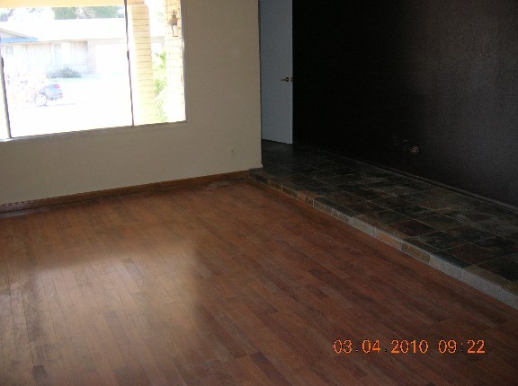 3754 East Charter Oak Road Phoenix, AZ 85032 - Photo 5 of 13 Easy care laminate wood