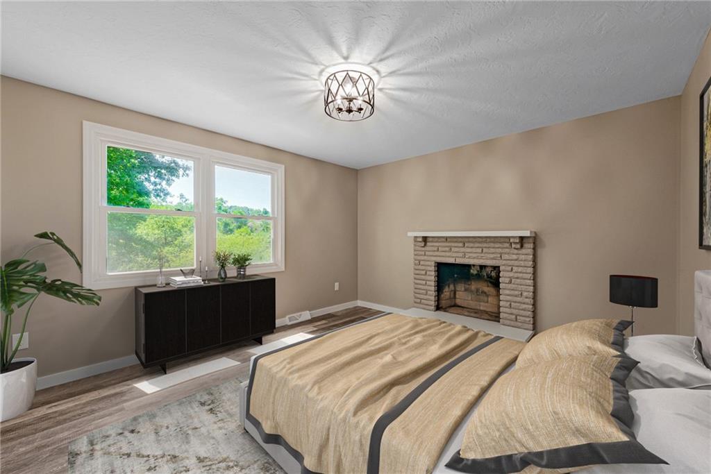 166 McConnell Road McDonald, PA 15057 - Photo 11 of 25 a bedroom with a large bed and a window