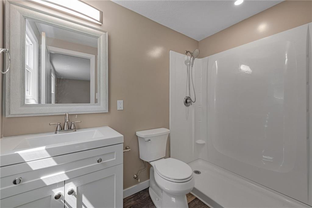 166 McConnell Road McDonald, PA 15057 - Photo 15 of 25 a bathroom with a sink toilet and shower