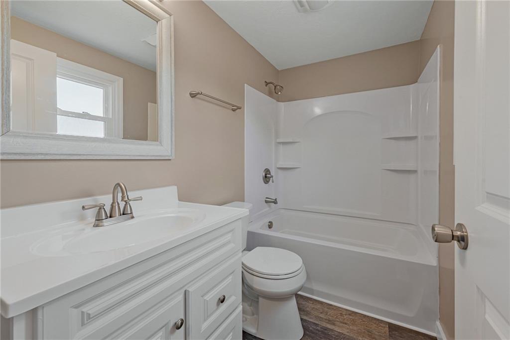 166 McConnell Road McDonald, PA 15057 - Photo 17 of 25 a bathroom with a sink a toilet and shower