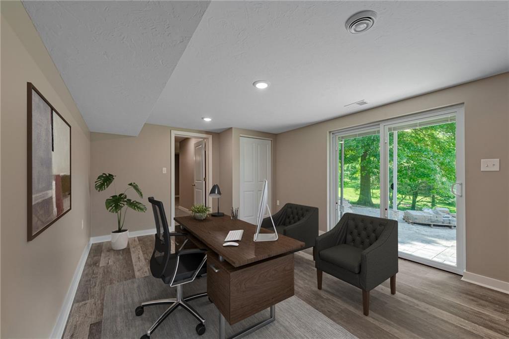 166 McConnell Road McDonald, PA 15057 - Photo 23 of 25 a living room with furniture a wooden floor and a large window