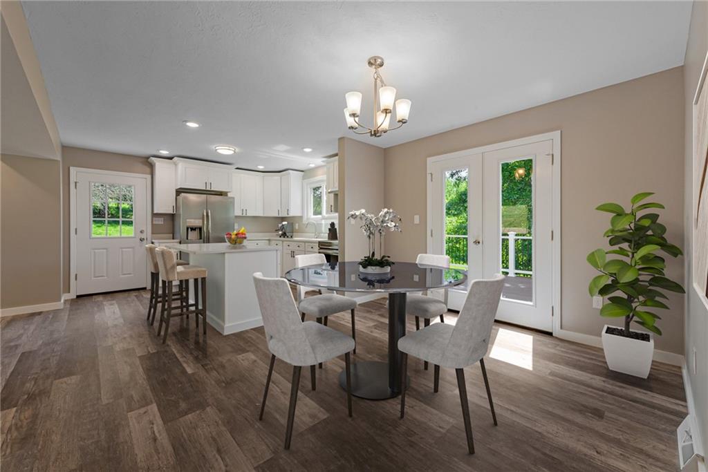 166 McConnell Road McDonald, PA 15057 - Photo 8 of 25 a view of a dining room with furniture window and wooden floor