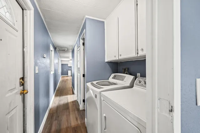 a bathroom with a granite countertop sink toilet a mirror and shower