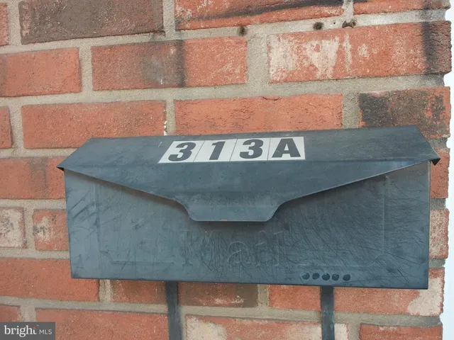 an empty room with wooden floor