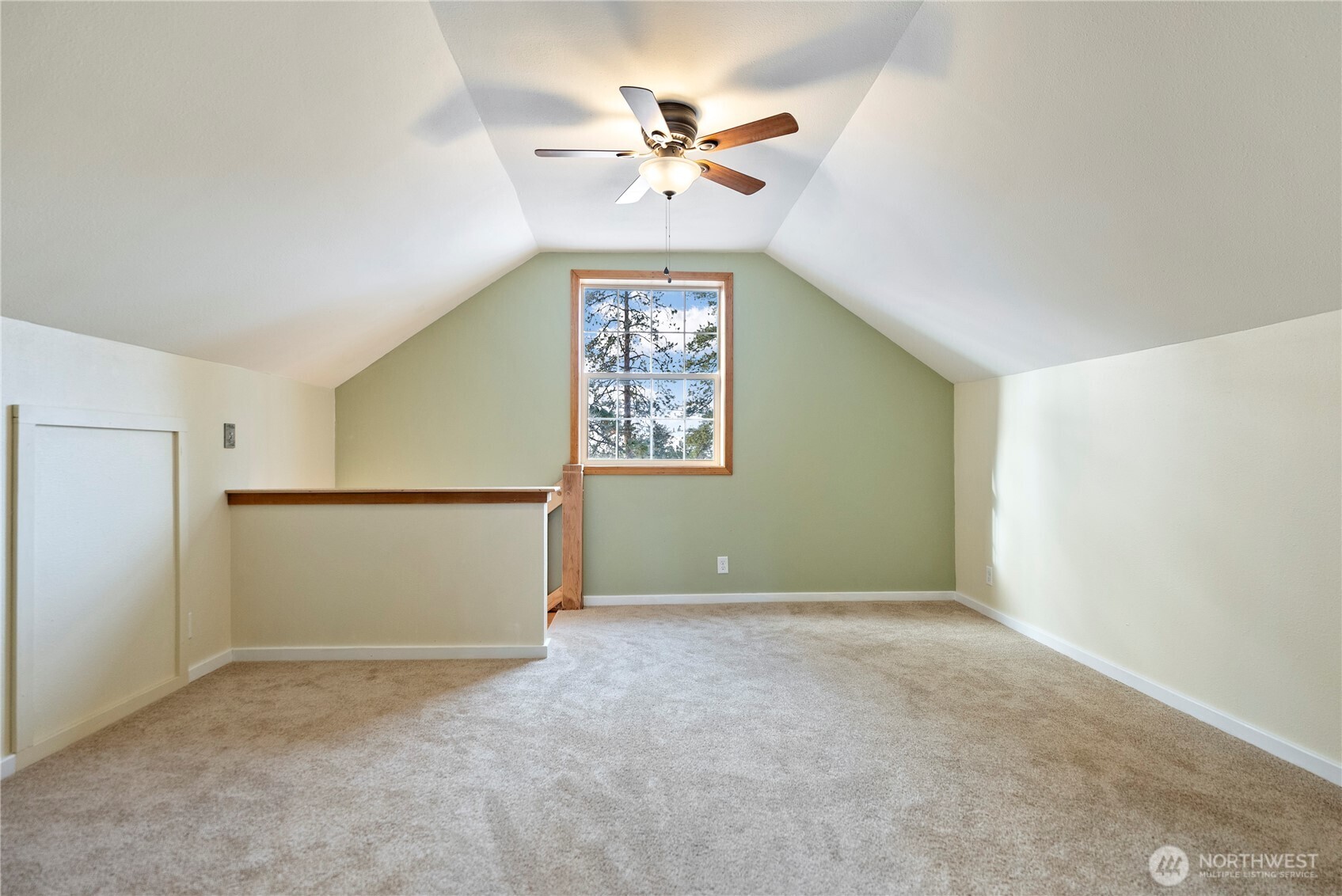 146 East Chewuch Road Winthrop, WA 98862 - Photo 27 of 38 an empty room with a ceiling fan and a window