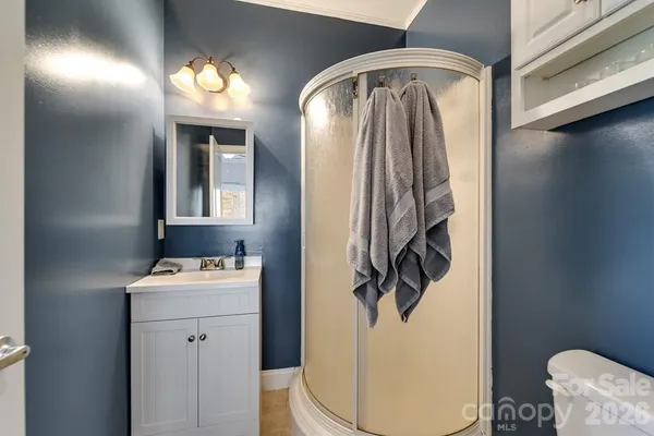 a bathroom with a sink and mirror
