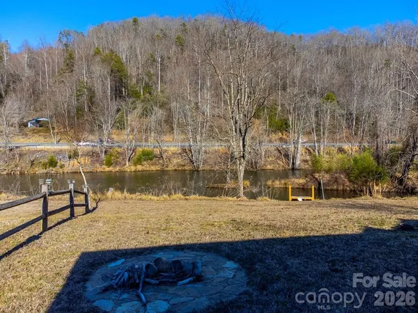 a view of a water with mountain