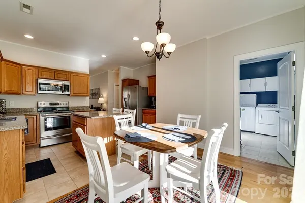a view of a dining room with furniture