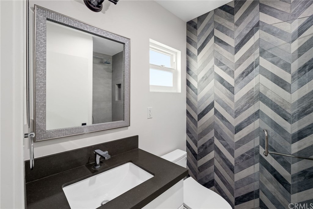 5 Clipper Road, Unit C Rancho Palos Verdes, CA 90275 - Photo 4 of 12 front view of a bathroom with a sink and a mirror