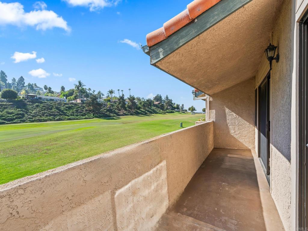 2639 Pirineos Way, Unit 231 Carlsbad, CA 92009 - Photo 25 of 34 a view of balcony with yard