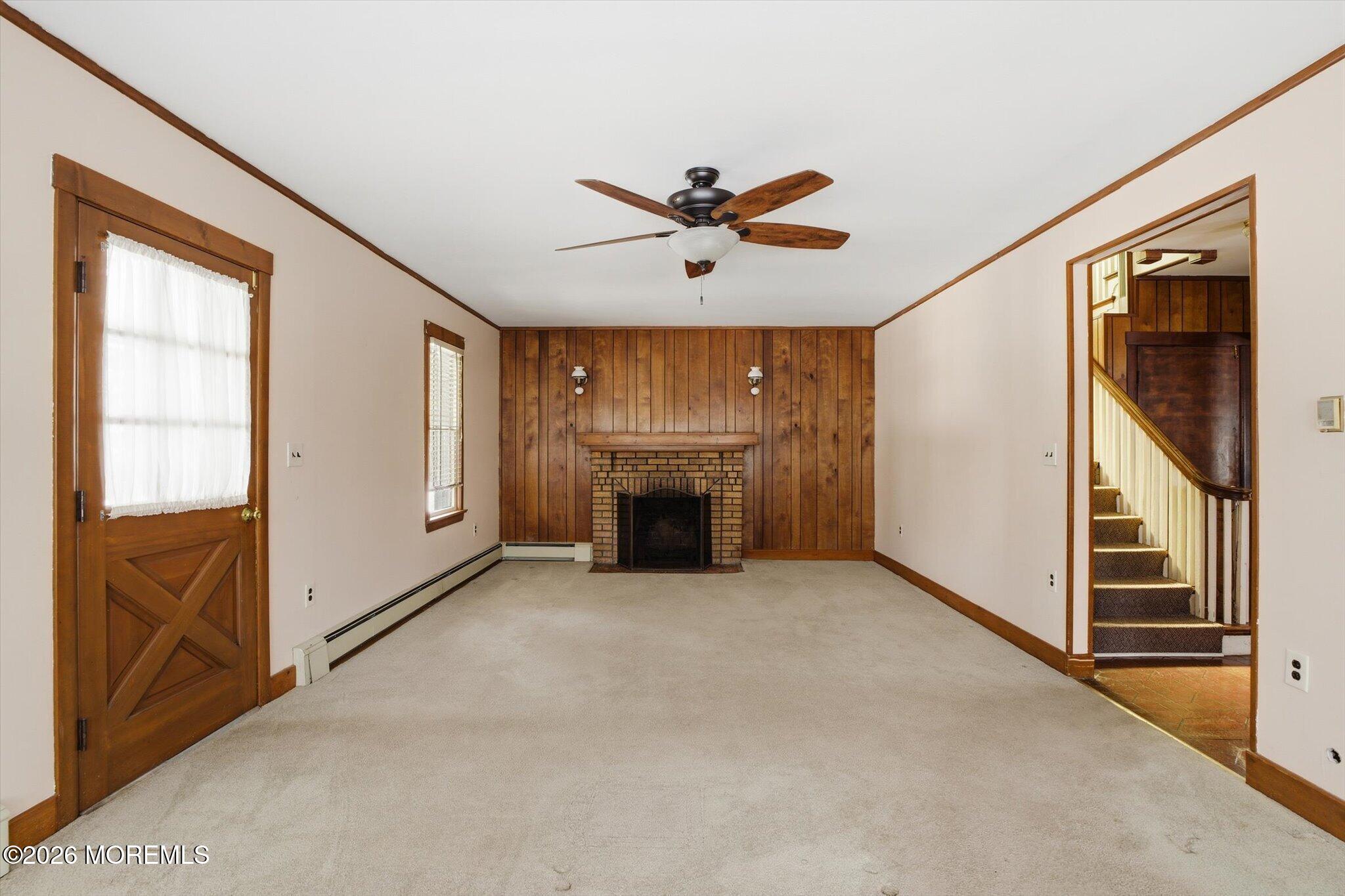 4121 Nottingham Way Hamilton, NJ 08690 - Photo 1 of 24 a view of an empty room with chandelier fan and windows