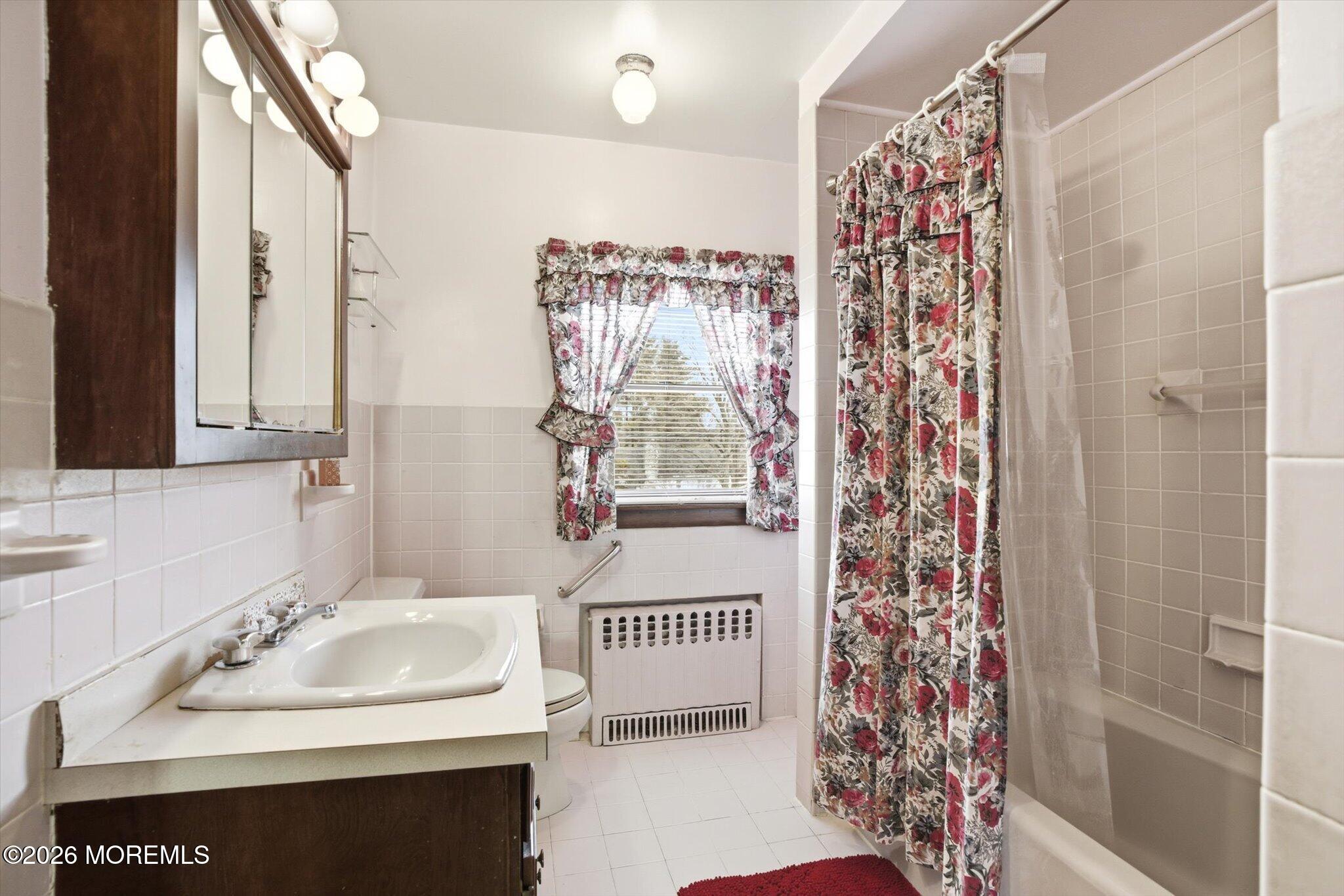 4121 Nottingham Way Hamilton, NJ 08690 - Photo 12 of 24 a bathroom with a sink and a mirror