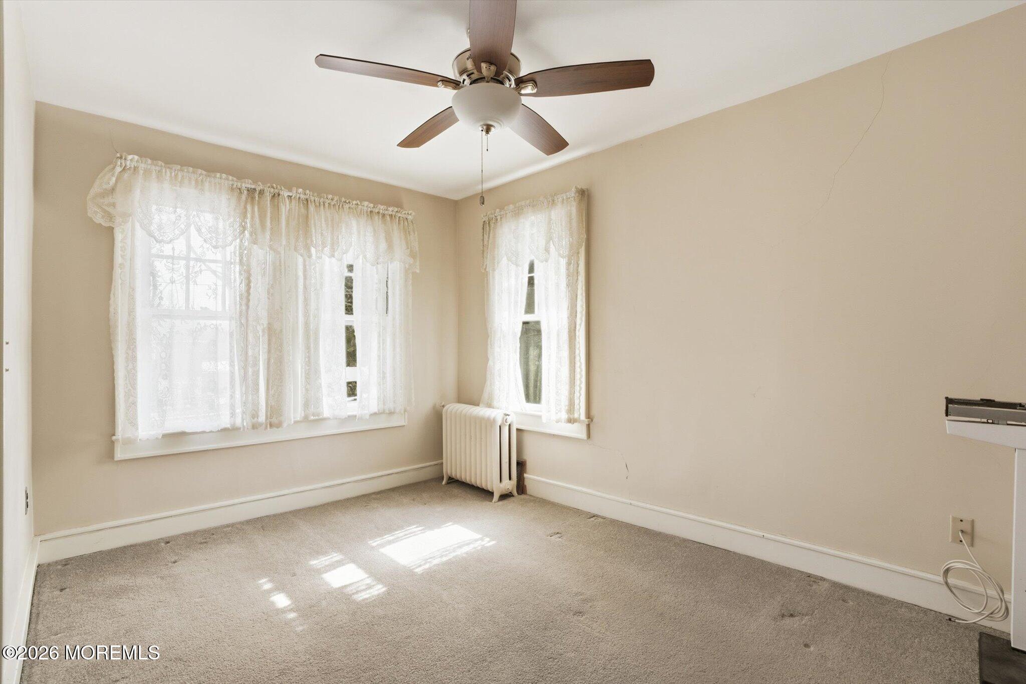 4121 Nottingham Way Hamilton, NJ 08690 - Photo 13 of 24 a view of an empty room with a window