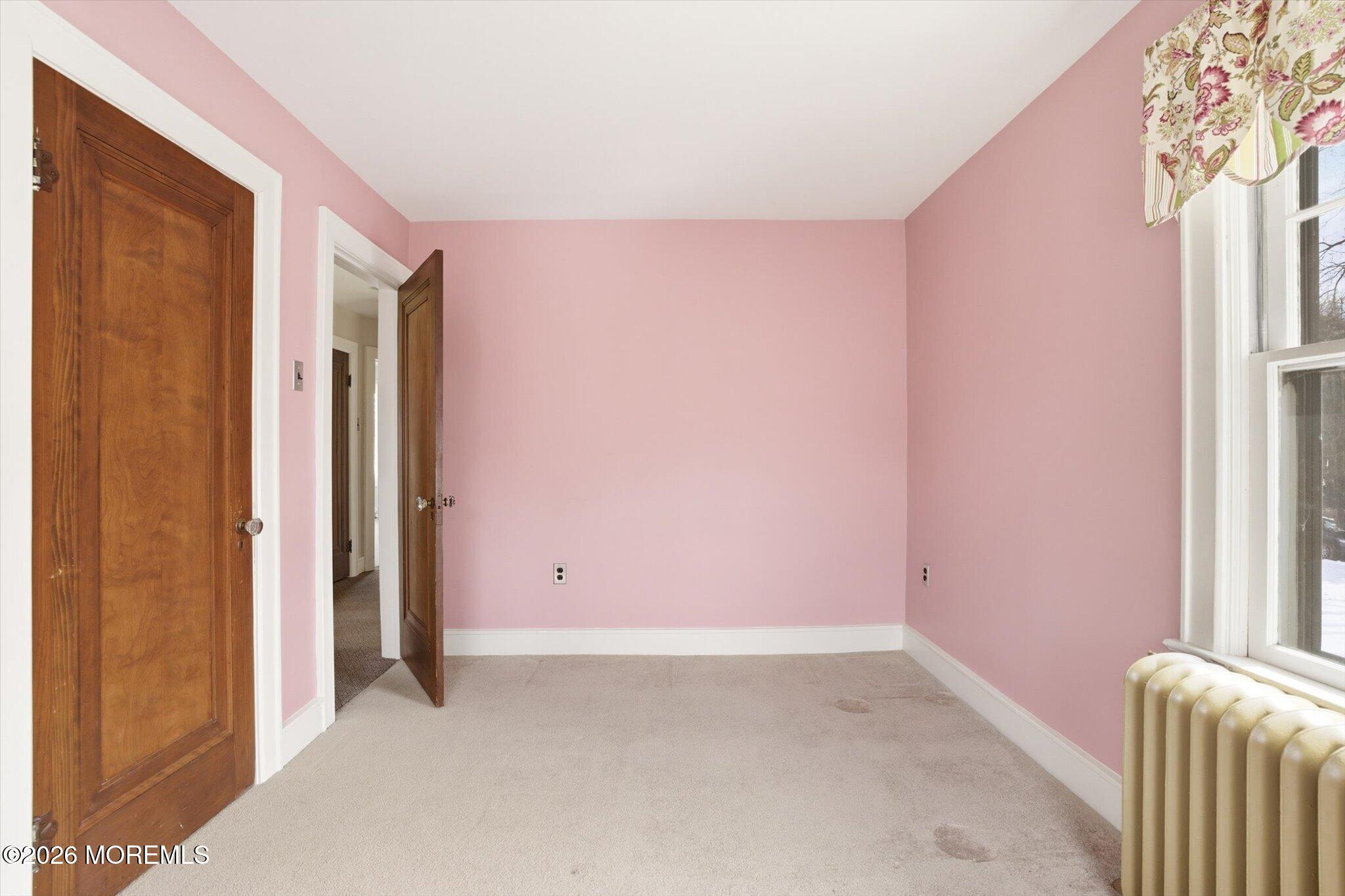 4121 Nottingham Way Hamilton, NJ 08690 - Photo 6 of 24 a view of an empty room with a window