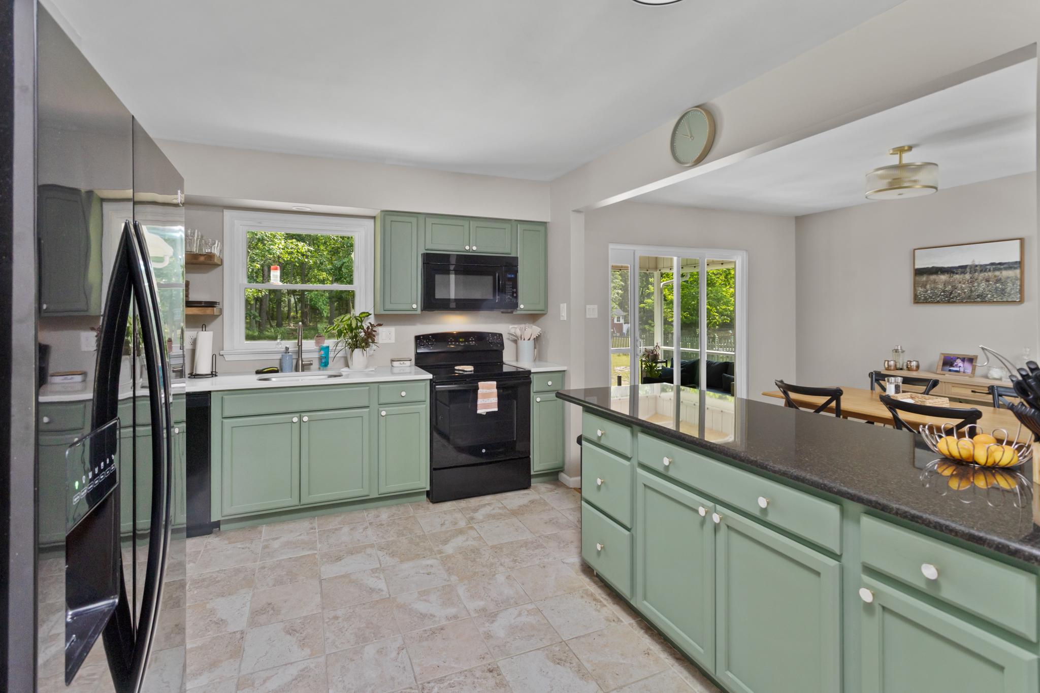 64 Patty Bowker Road Tabernacle, NJ 08088 - Photo 11 of 35 Kitchen opens to dining area and screened porch.