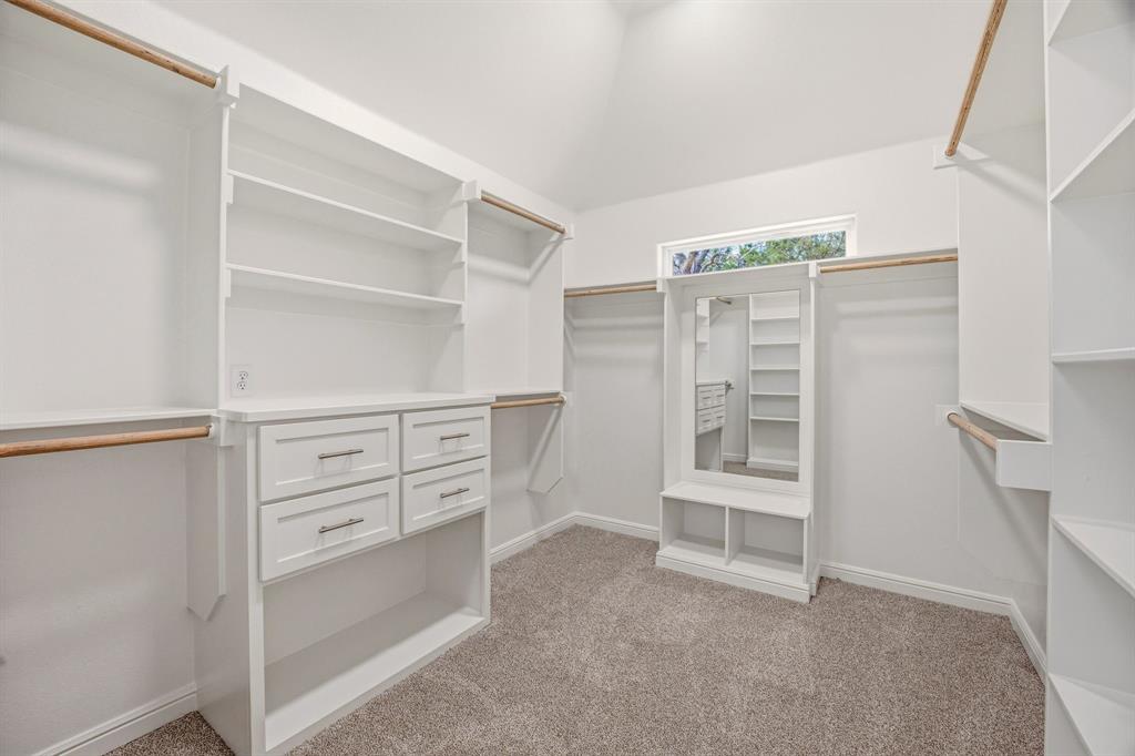 2017 Forest Bridge Azle, TX 76020 - Photo 20 of 30 Walk in closet featuring light colored carpet