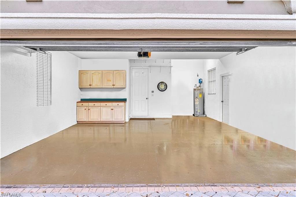 6676 Glen Arbor Way Naples, FL 34119 - Photo 22 of 23 a view of a garage