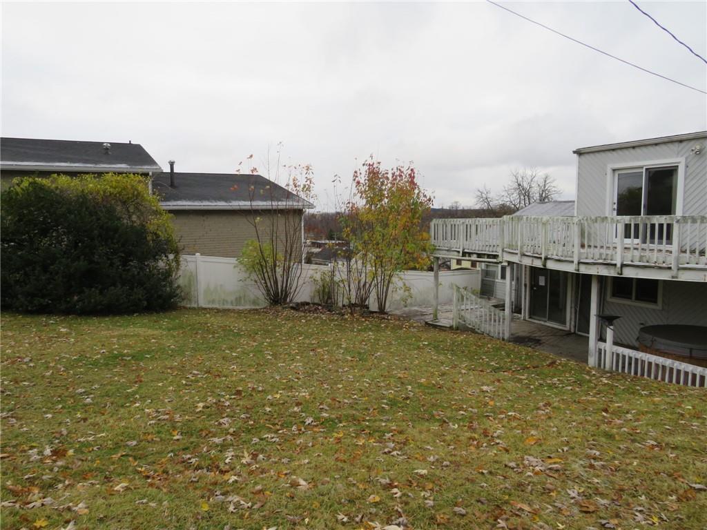 11175 Old Trail Road Irwin, PA 15642 - Photo 20 of 48 a view of a house with a backyard