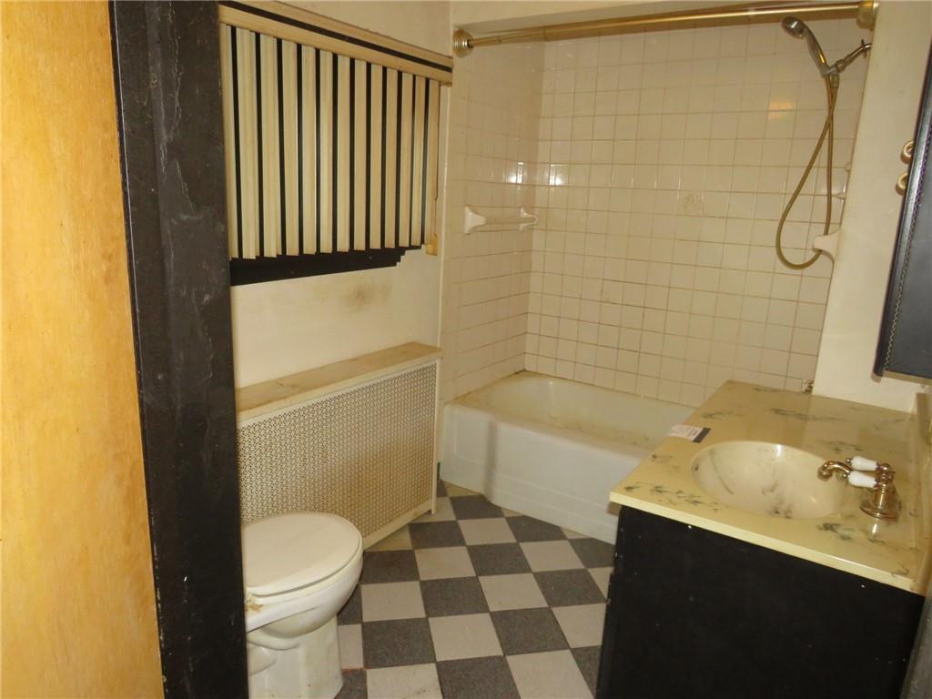 11175 Old Trail Road Irwin, PA 15642 - Photo 27 of 48 a bathroom with a sink a toilet and shower