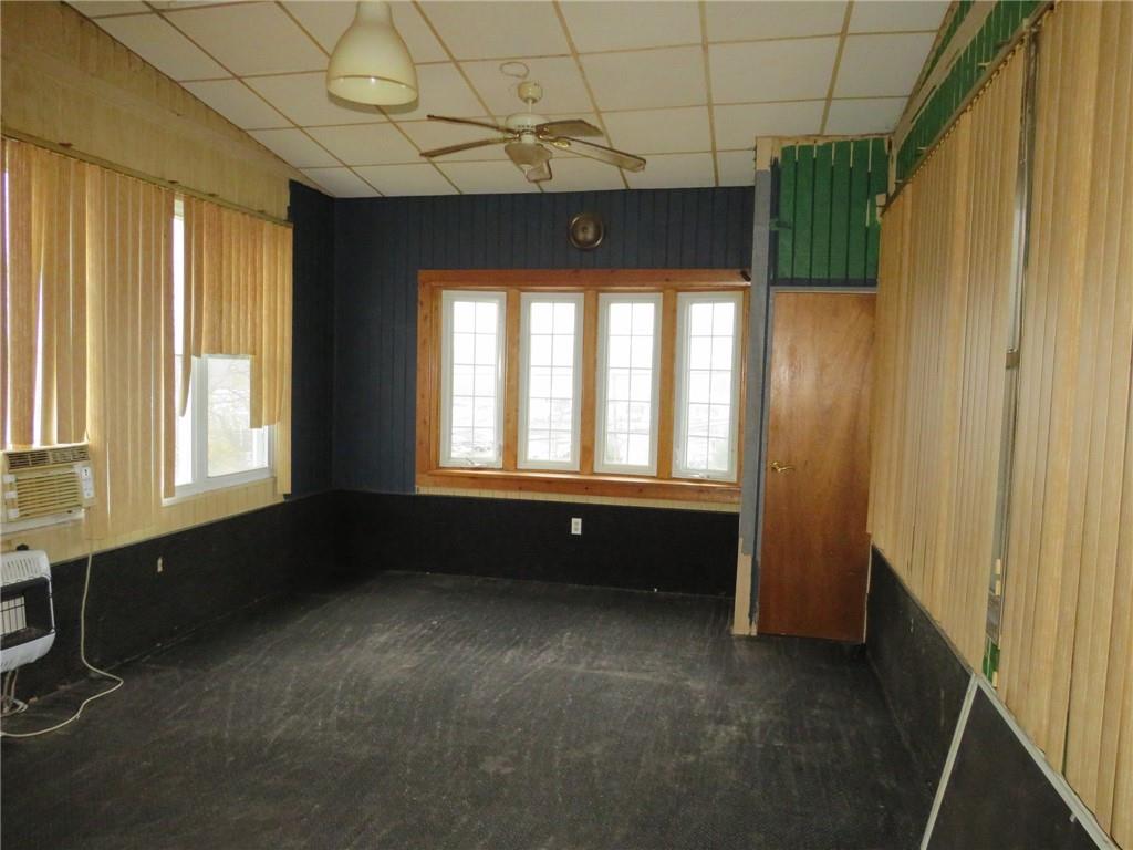 11175 Old Trail Road Irwin, PA 15642 - Photo 7 of 48 a living room with a bed and a window