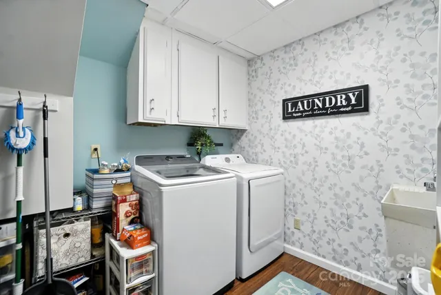 a utility room with dryer and washer