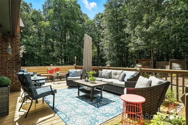 a outdoor living space with furniture and garden view