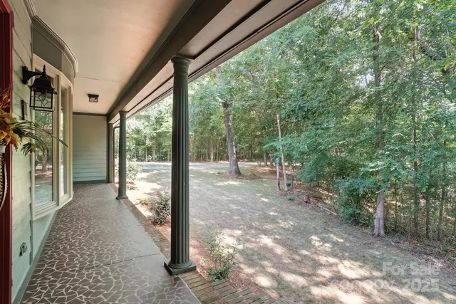 a view of backyard with green space