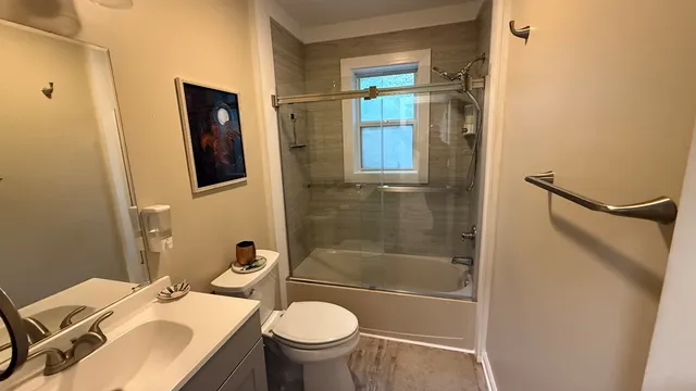 a bathroom with a sink and a shower