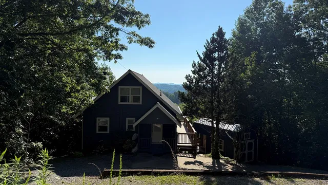 a view of an empty room with windows