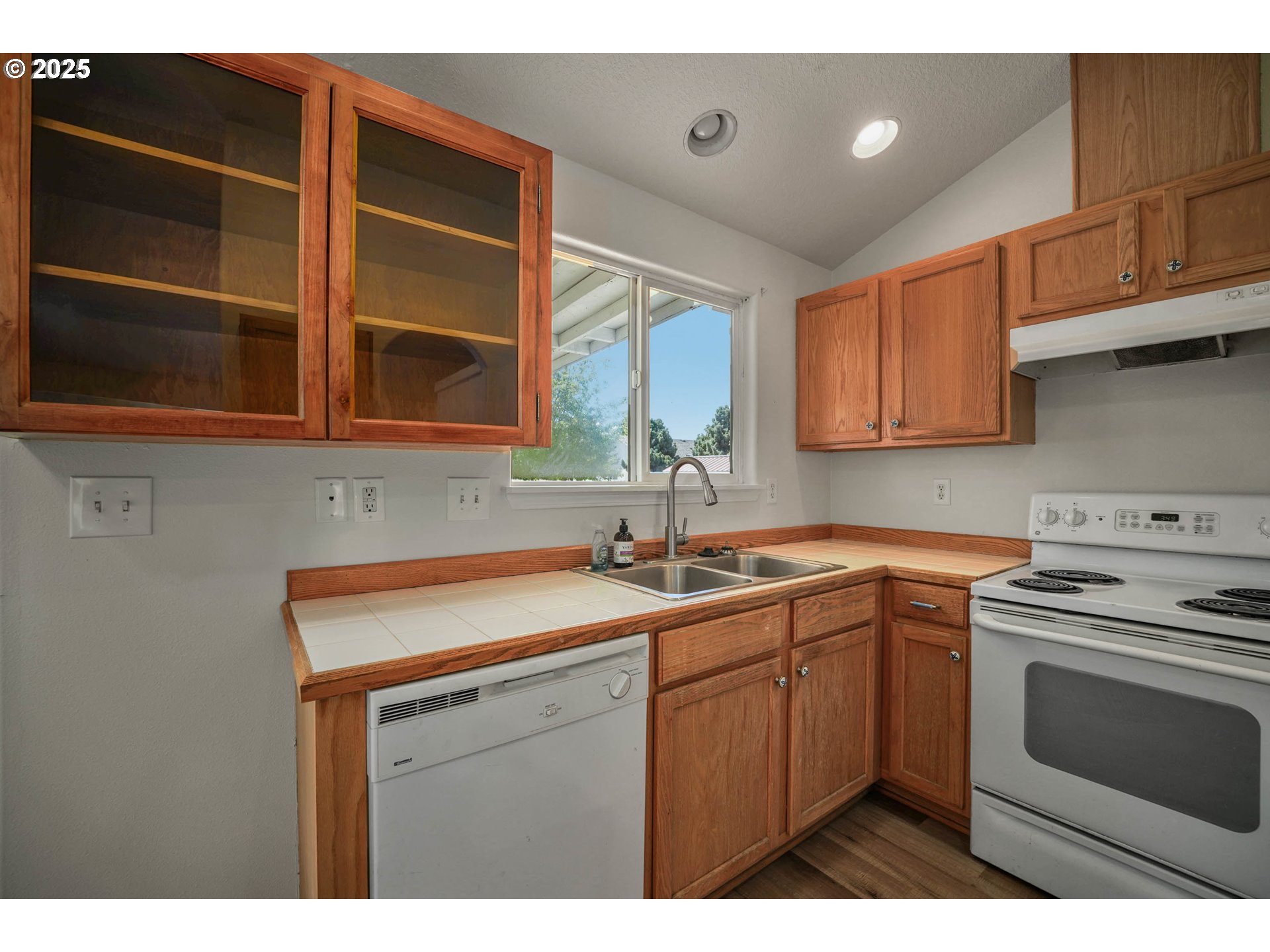 1033 E Street Independence, OR 97351 - Photo 13 of 36 a kitchen with a sink and cabinets