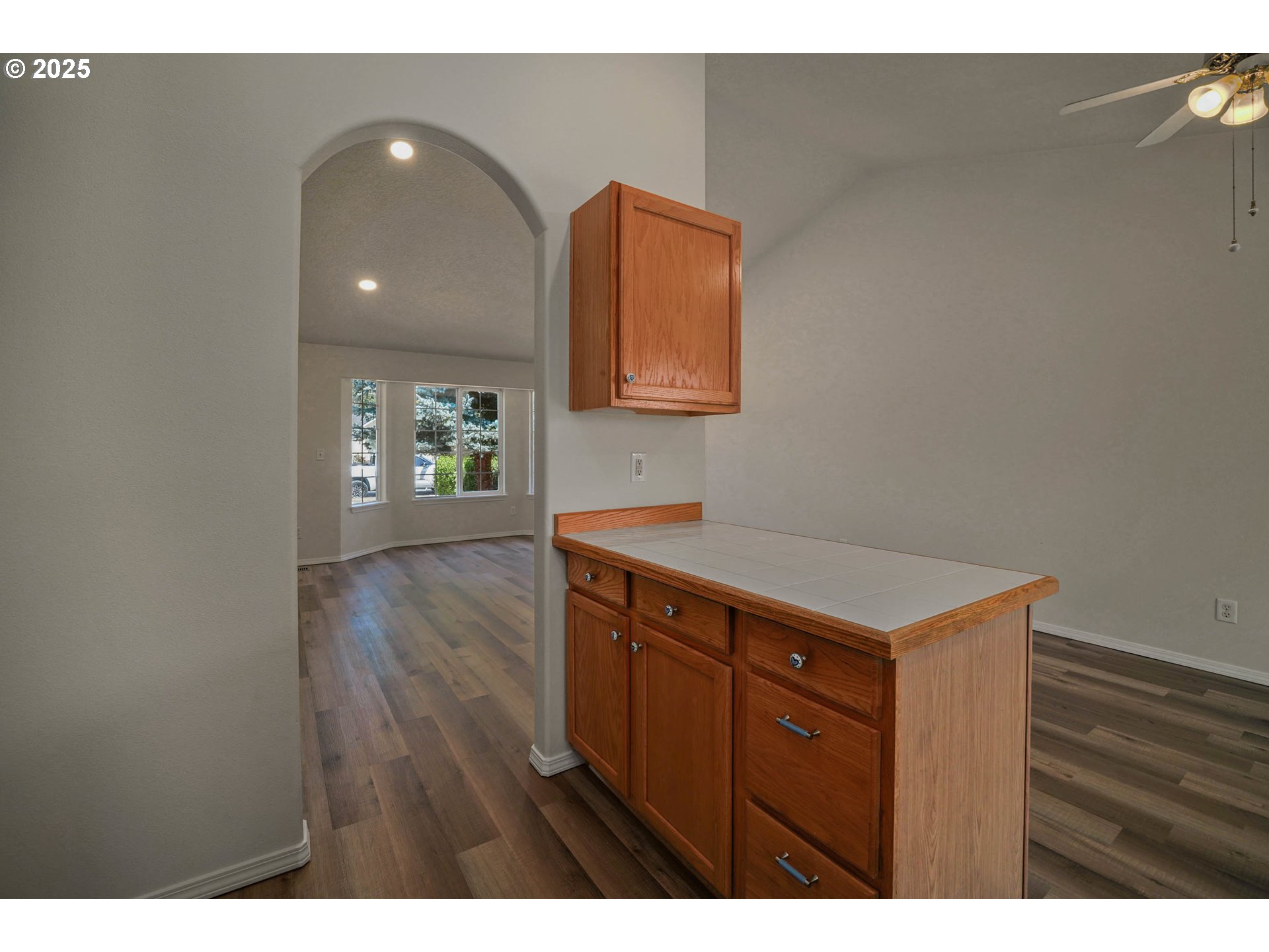 1033 E Street Independence, OR 97351 - Photo 14 of 36 a kitchen with a wooden floor and a sink