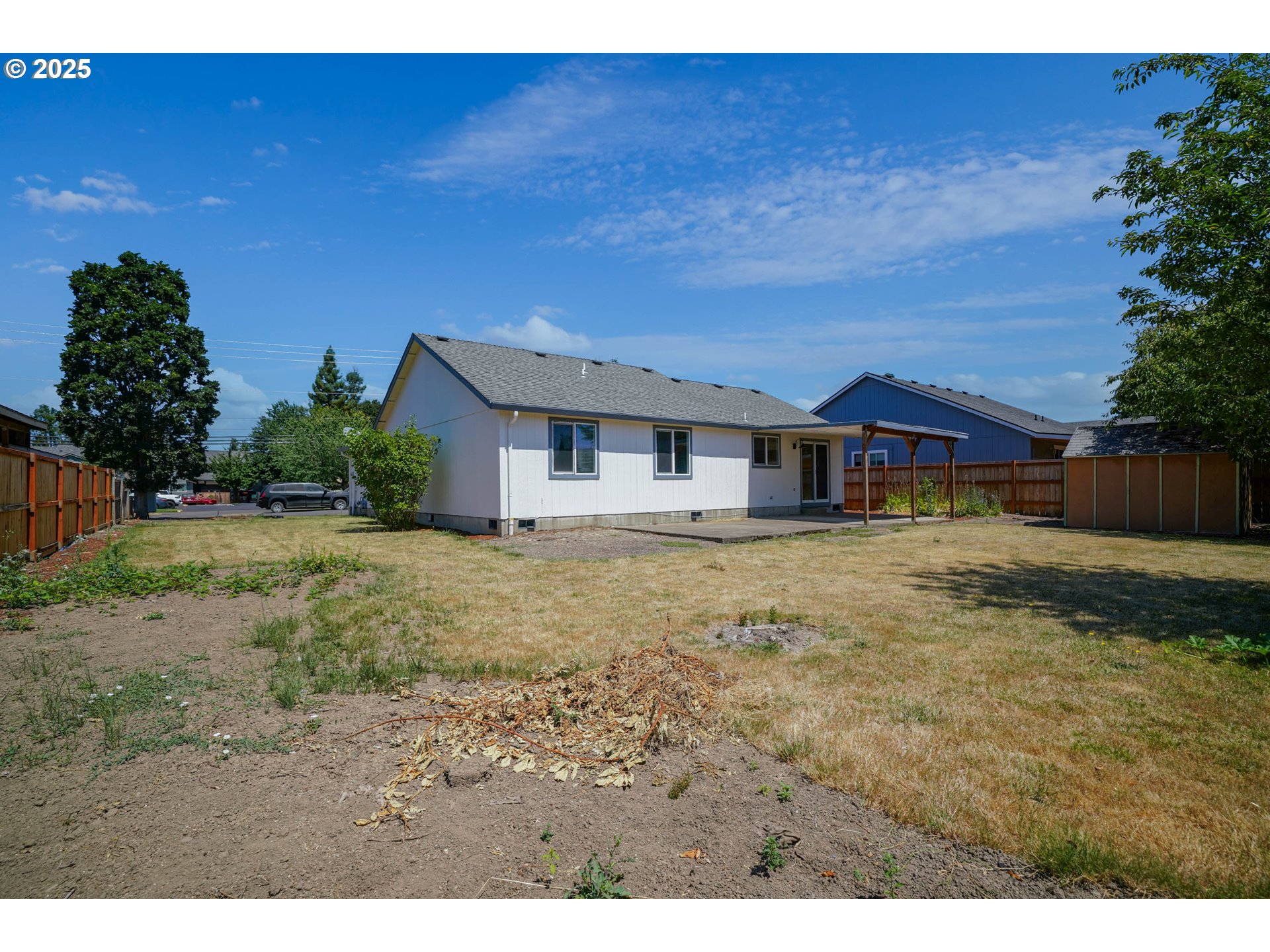 1033 E Street Independence, OR 97351 - Photo 34 of 36 a house view with a garden space