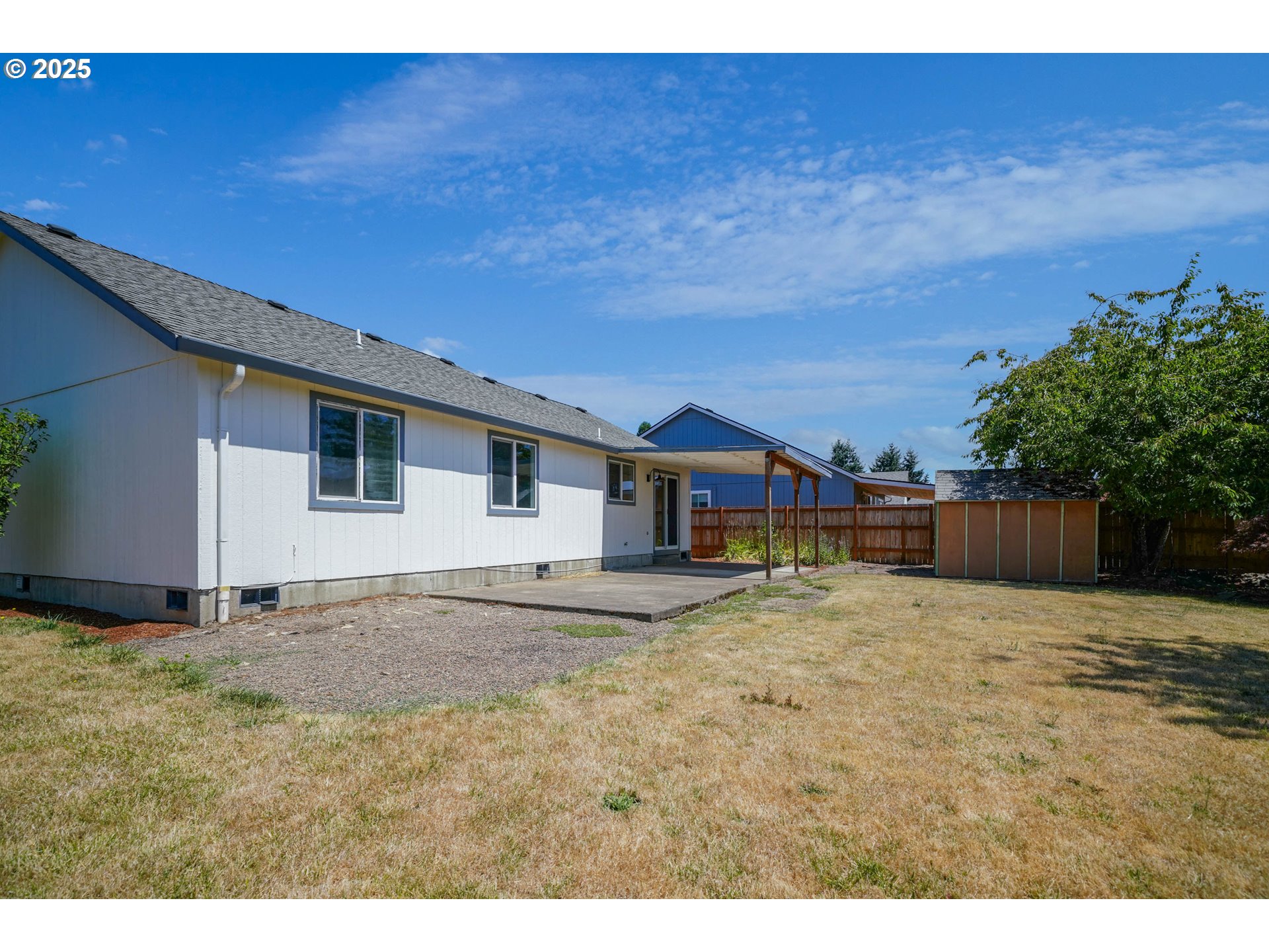 1033 E Street Independence, OR 97351 - Photo 35 of 36 a view of a house with a patio