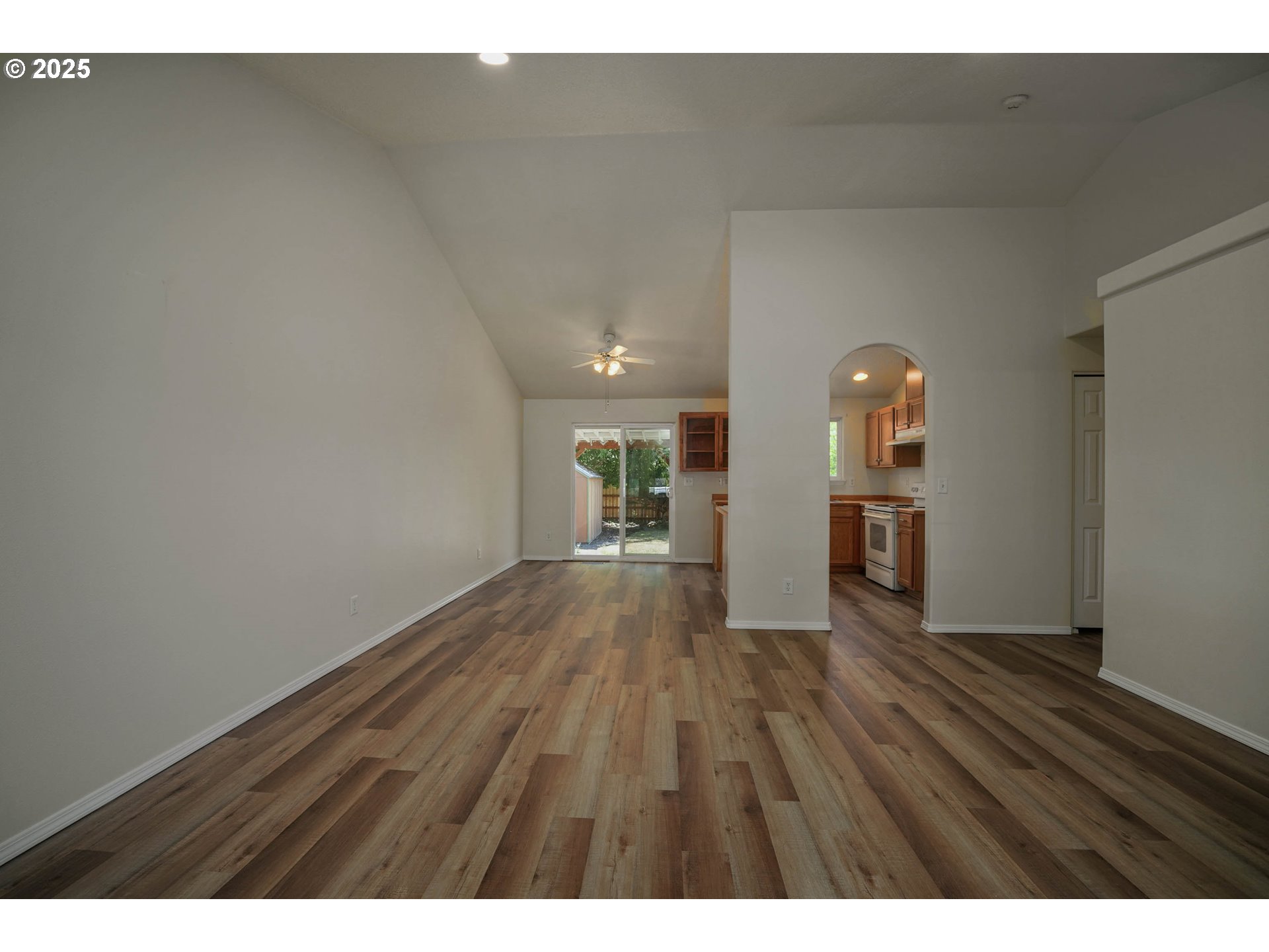 1033 E Street Independence, OR 97351 - Photo 8 of 36 a view of empty room with wooden floor