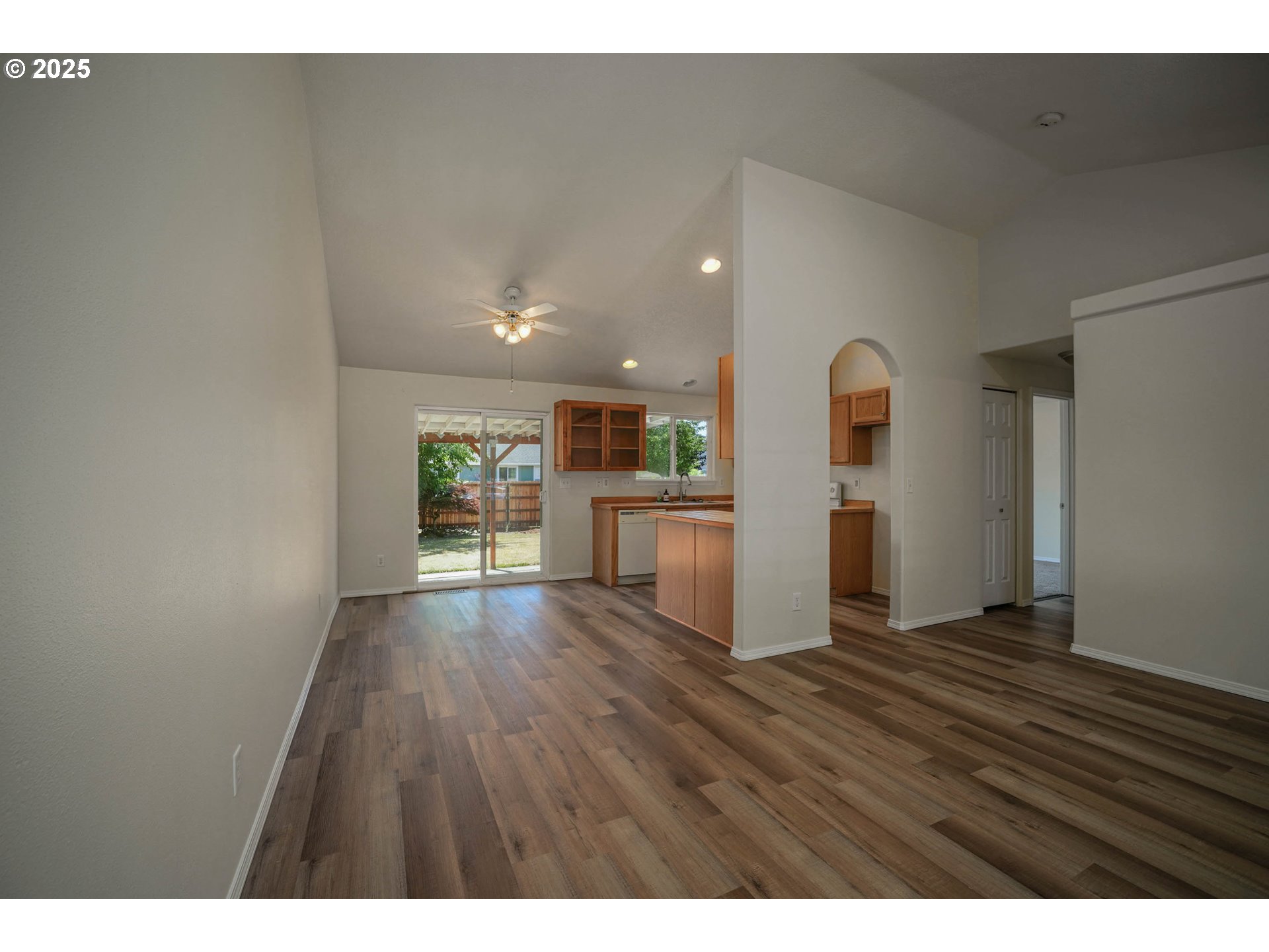 1033 E Street Independence, OR 97351 - Photo 9 of 36 a view of wooden floor and windows in a room