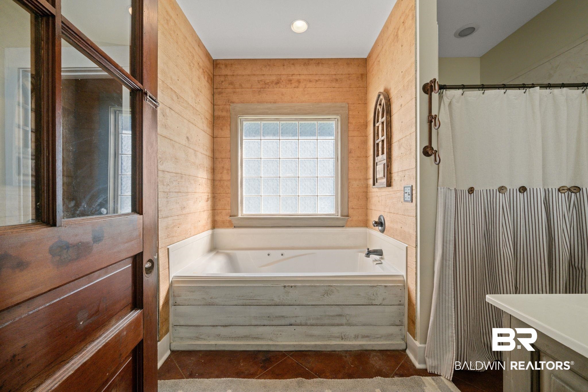 15635 North A N Brady Road Bay Minette, AL 36507 - Photo 24 of 51 Bathroom with wooden walls, vanity, separate shower and tub, and tile patterned floors