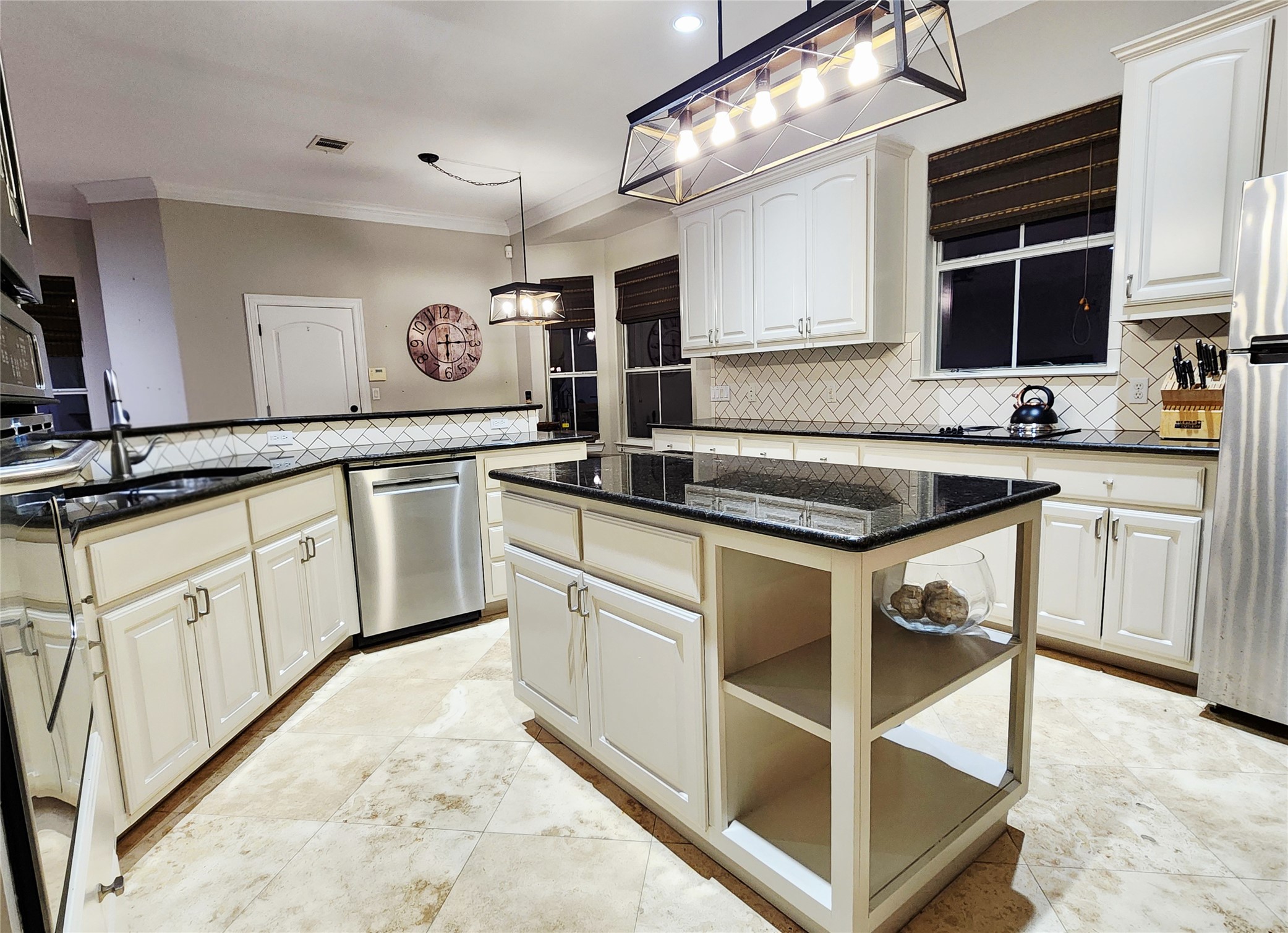 152 Silver Hawk Court Dripping Springs, TX 78620 - Photo 11 of 31 a kitchen with granite countertop a sink stainless steel appliances and cabinets
