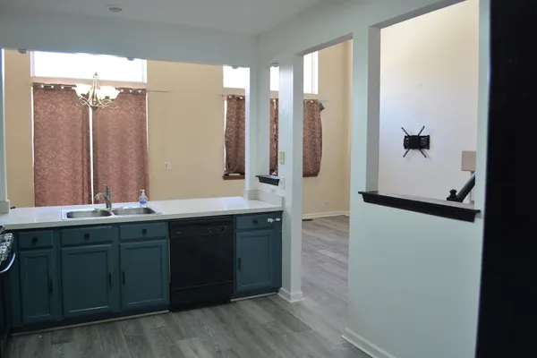 a bathroom with a double vanity sink and mirror