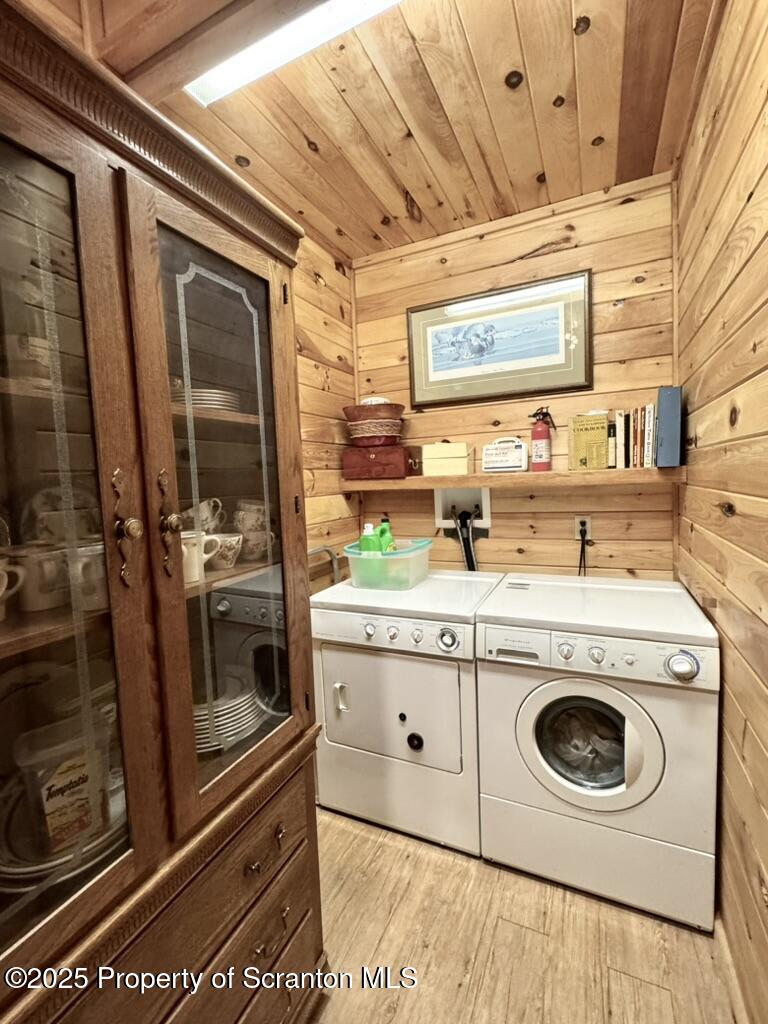 498 Penn-York Road Starlight, PA 18461 - Photo 16 of 48 a utility room with sink dryer and washer