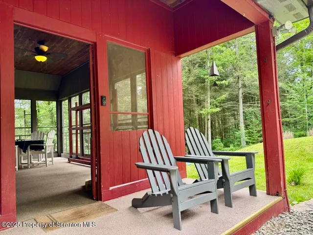 a room with furniture and a large window